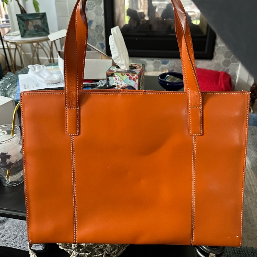 orange wilson’s leather tote bag